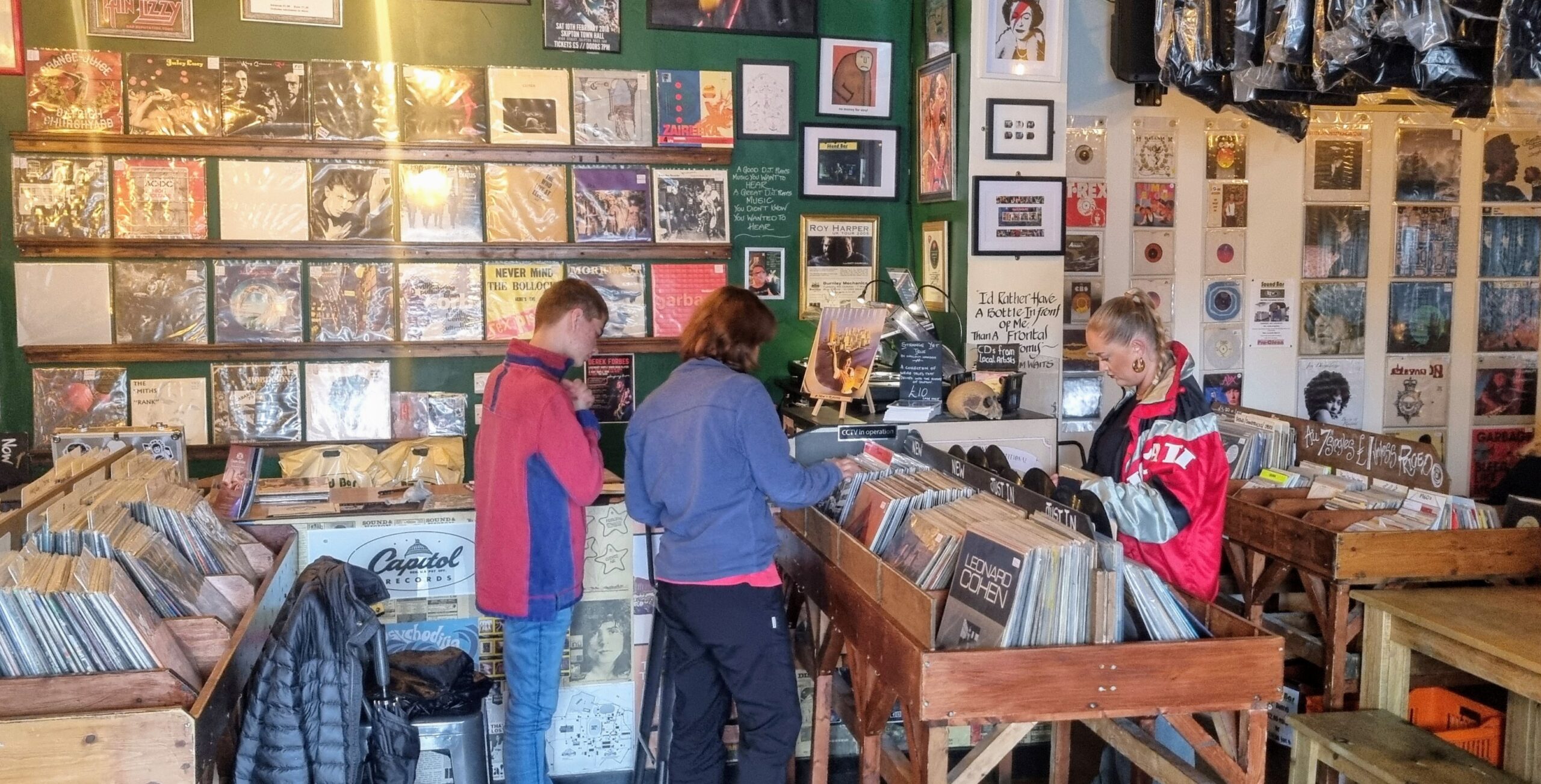 Another photo of customers browsing the Sound Bar record store