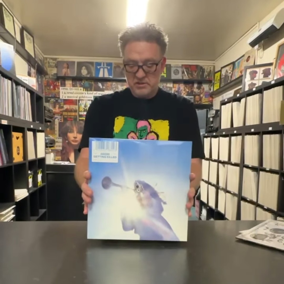 Dave from the Sound Bar and Revo holding the runner up album.